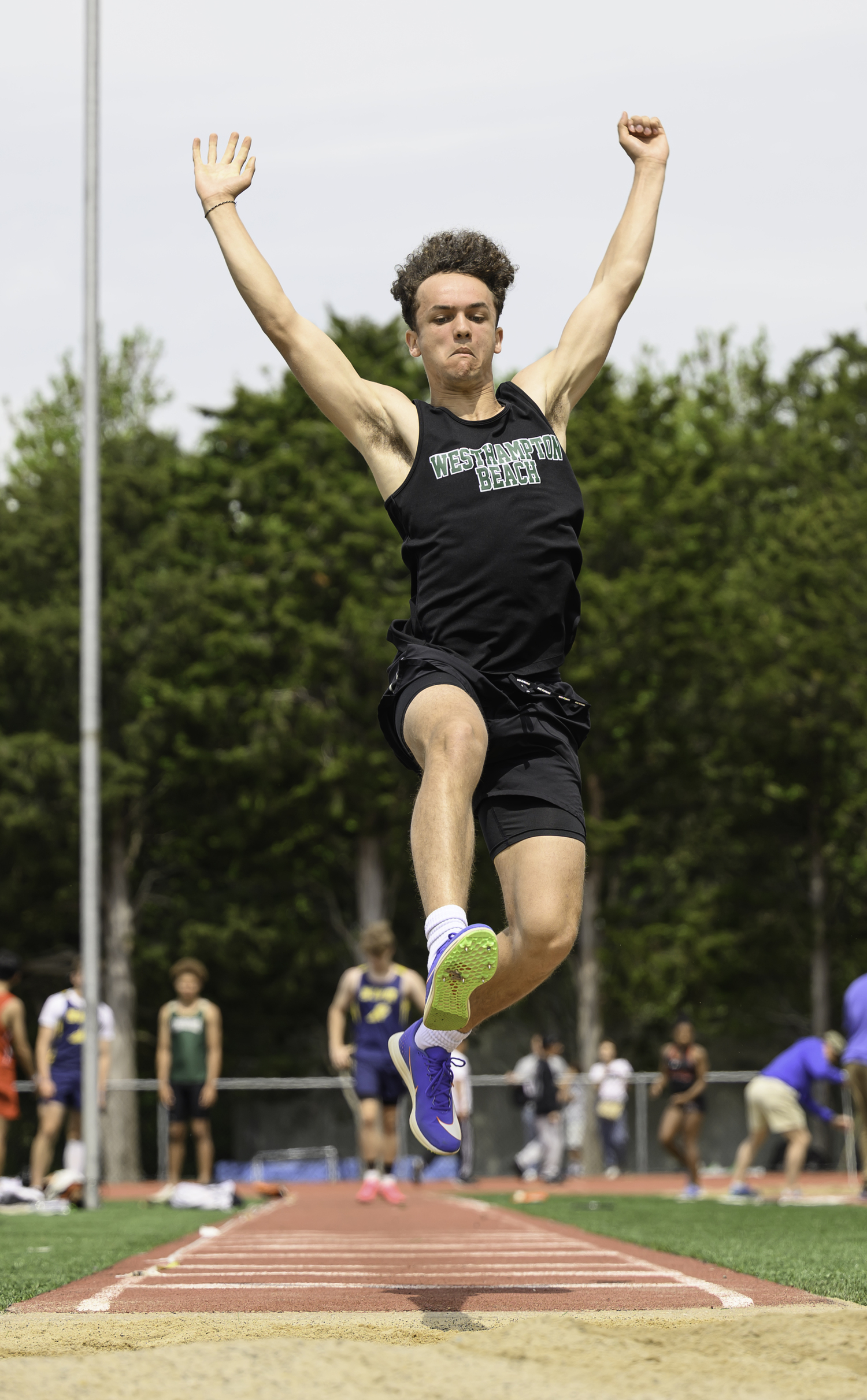 Ezekiel McCrary competing in the long jump of the pentathlon in which he placed second overall in.   MARIANNE BARNETT