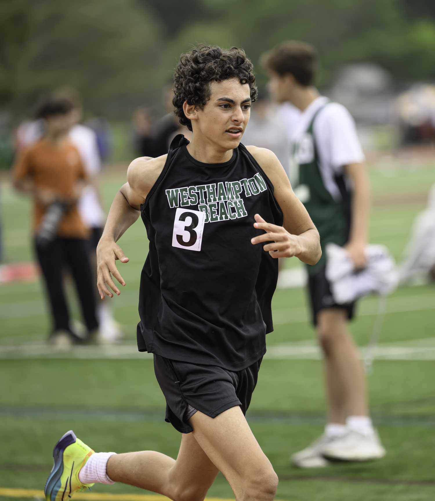 Levi Salvi in the freshman/sophomore 1,600-meter race.  MARIANNE BARNETT