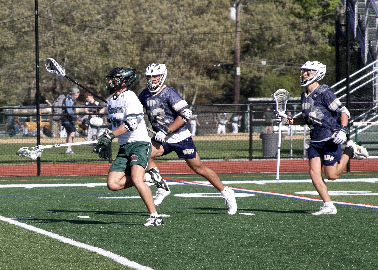 Senior Brody Schaffer carries the ball into Bayport-Blue Point's zone. DESIRÉE KEEGAN