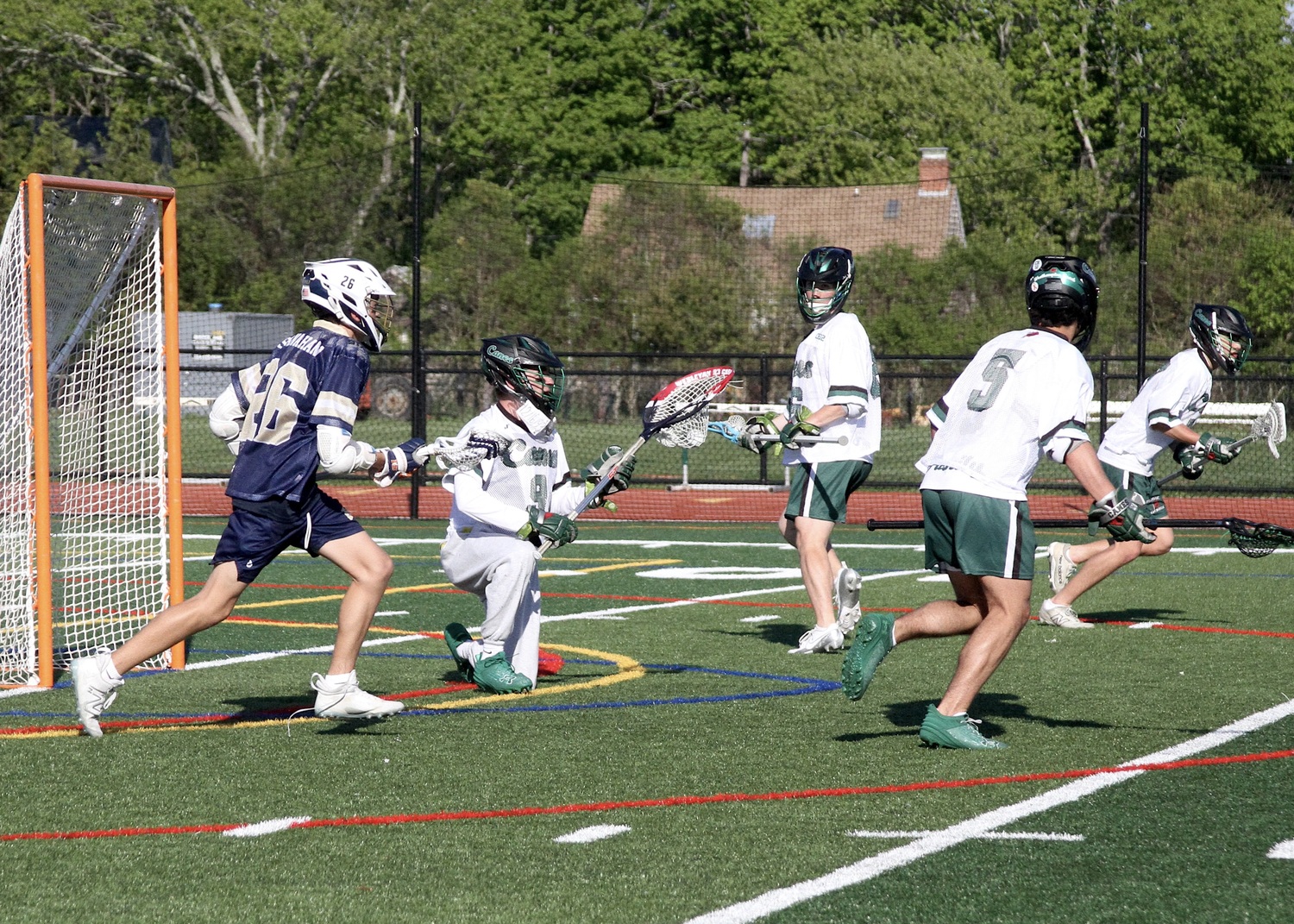 Senior Charlie Beasley scoops up the ball. DESIRÉE KEEGAN