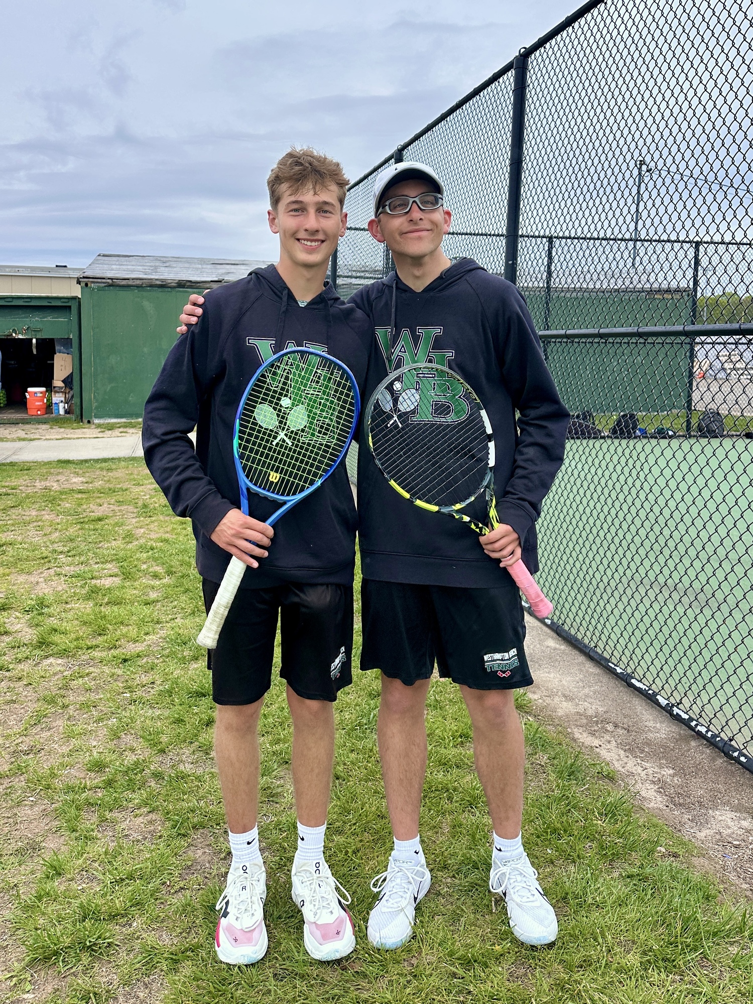 Junior Bryce Groth and senior Giancarlo Volpe after their Division IV consolation match win for third place. BILL GROTH