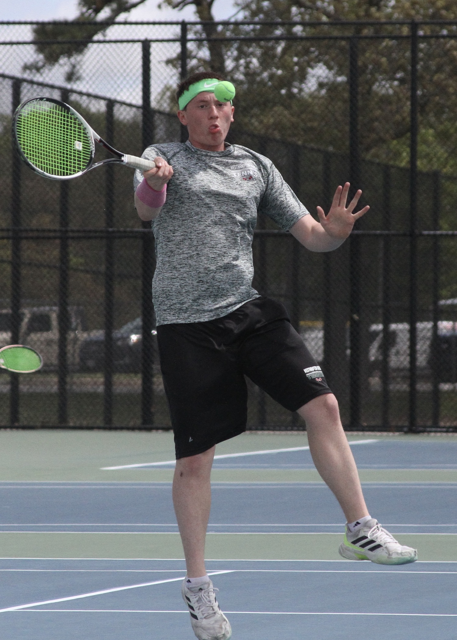 Senior Matt Moran sends the ball back over the net. DESIRÉE KEEGAN