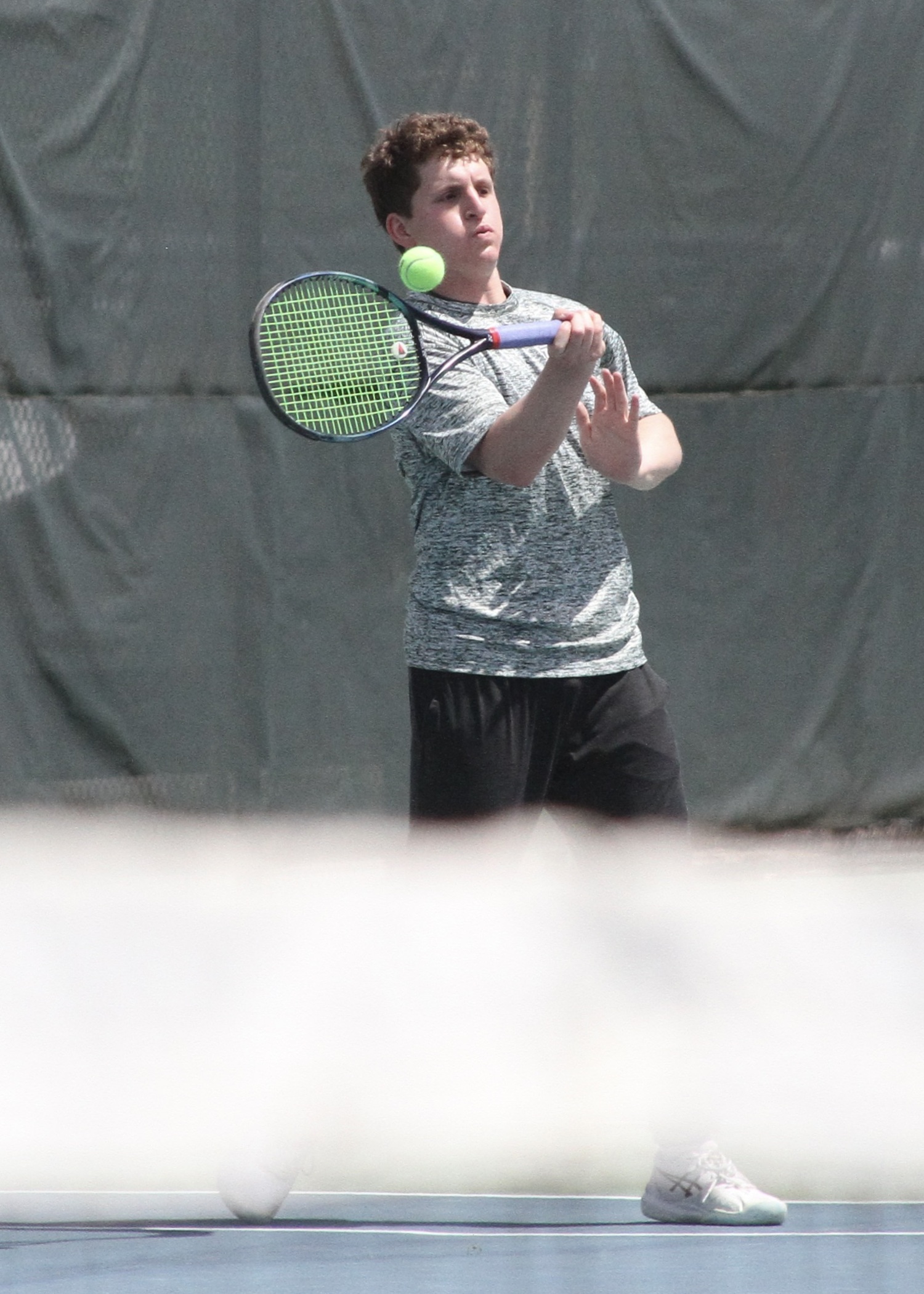 Junior Robby Schumacher keeps the point alive. DESIRÉE KEEGAN