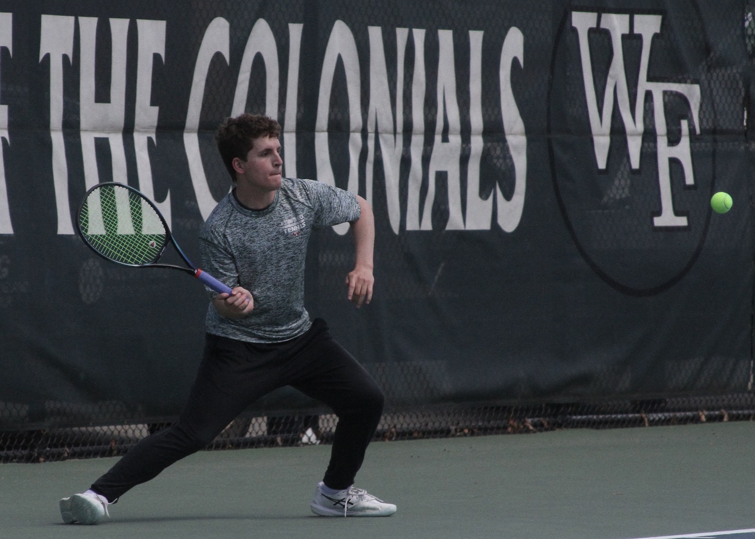 Junior Robby Schumacher rallies. DESIRÉE KEEGAN