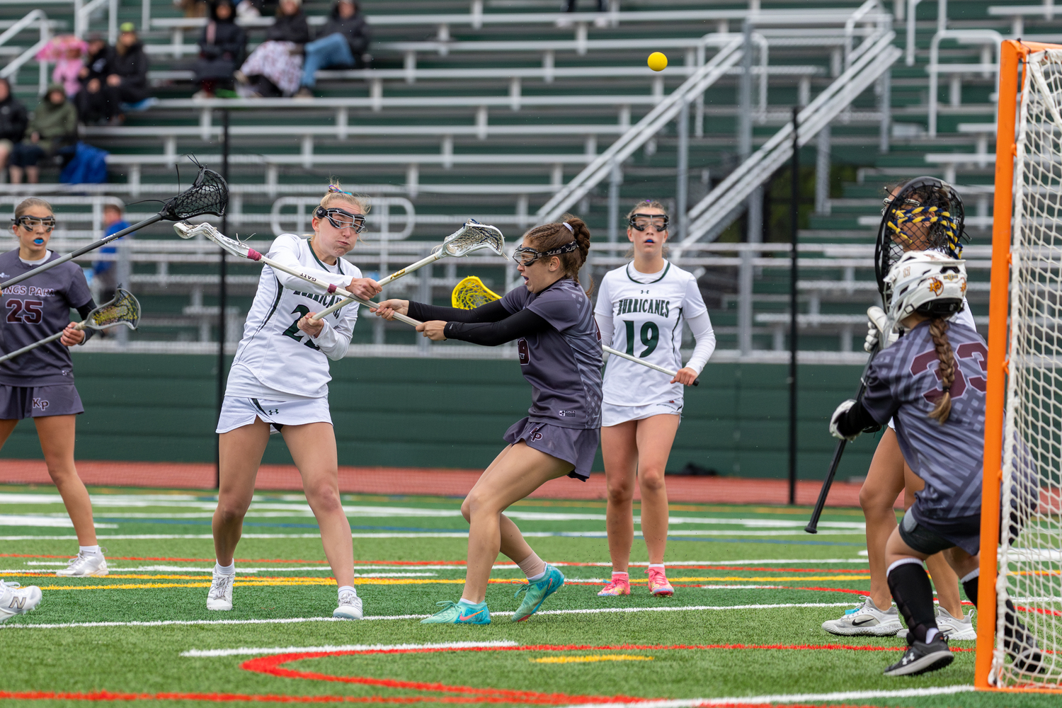 Junior midfielder Maiya Boughal hits her mark on a high shot. RON ESPOSITO