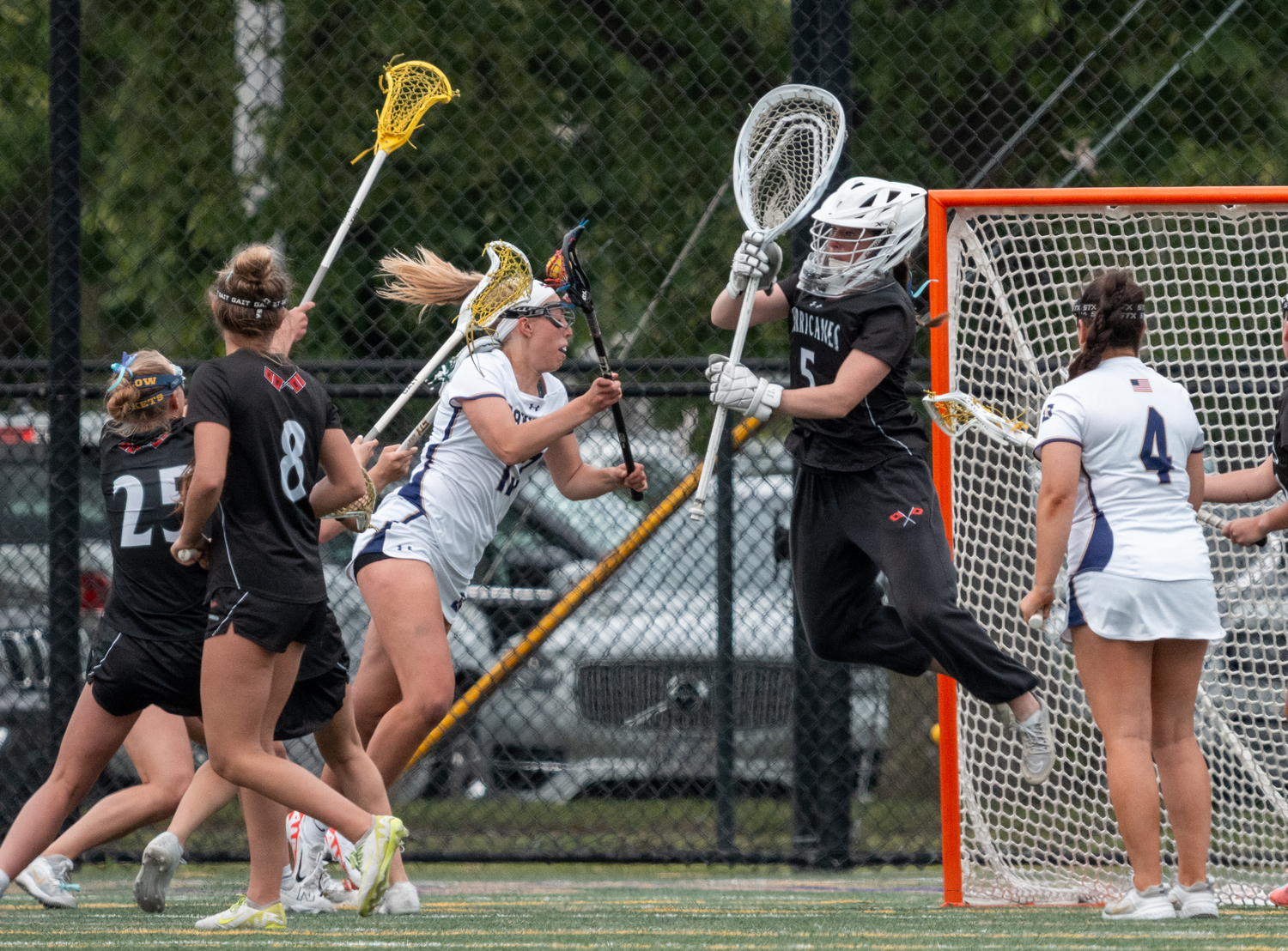 Senior goalkeeper Maya Farnan, who broke a school record with 500 career saves, moves to make one of her six stops. RON ESPOSITO