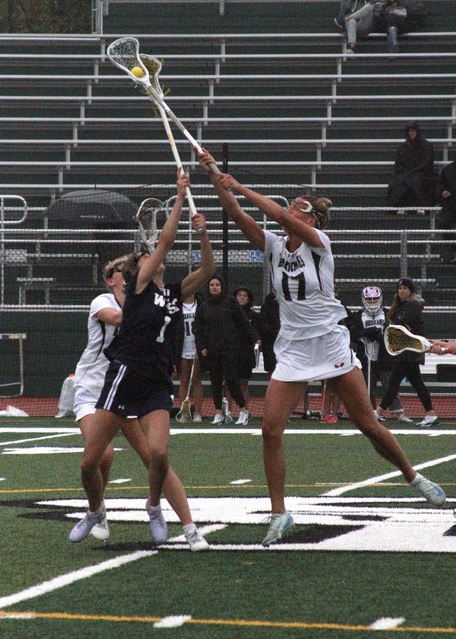 Senior midfielder Reese King battles in the draw circle. DESIRÉE KEEGAN
