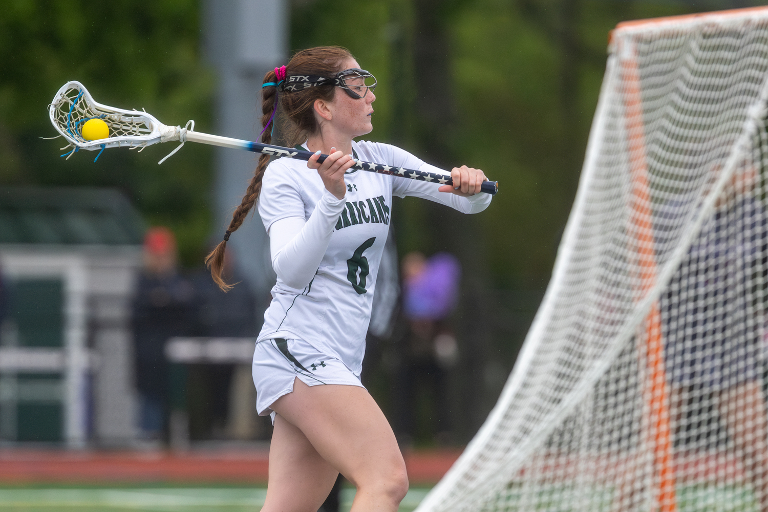 Sophomore attack Tierney McEntee passes the ball. RON ESPOSITO