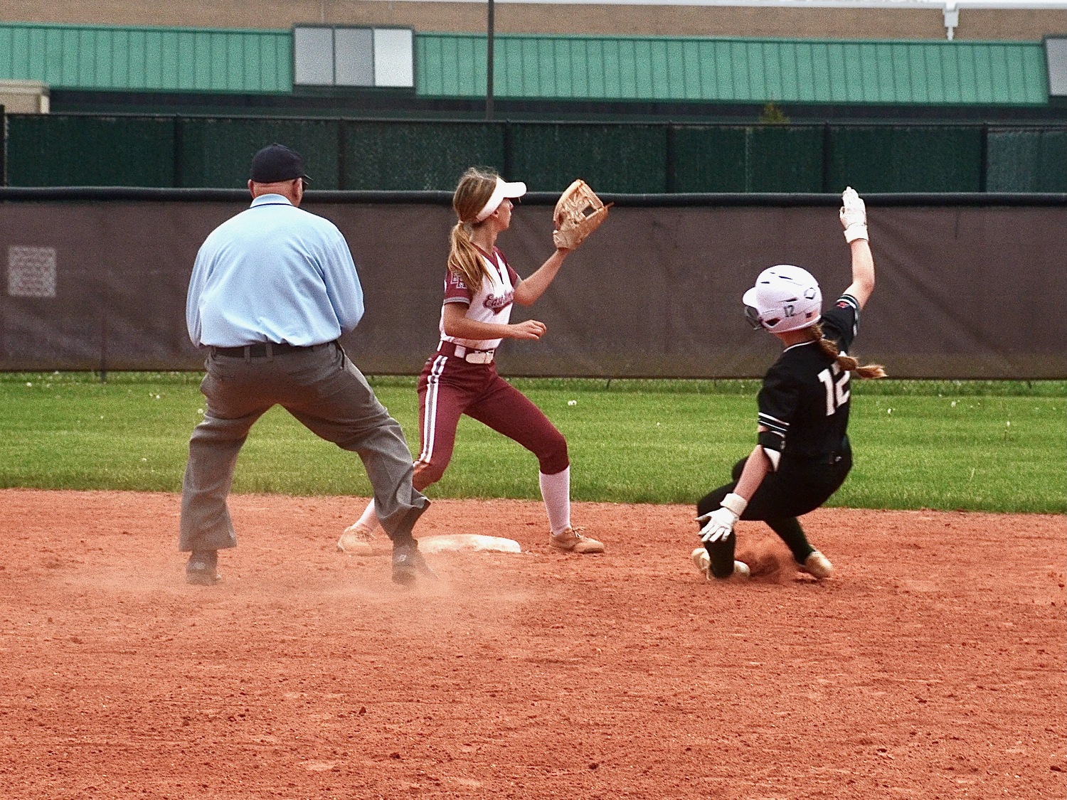 Junior second baseman Kayla Blair slides safety into second. KYRIL BROMLEY