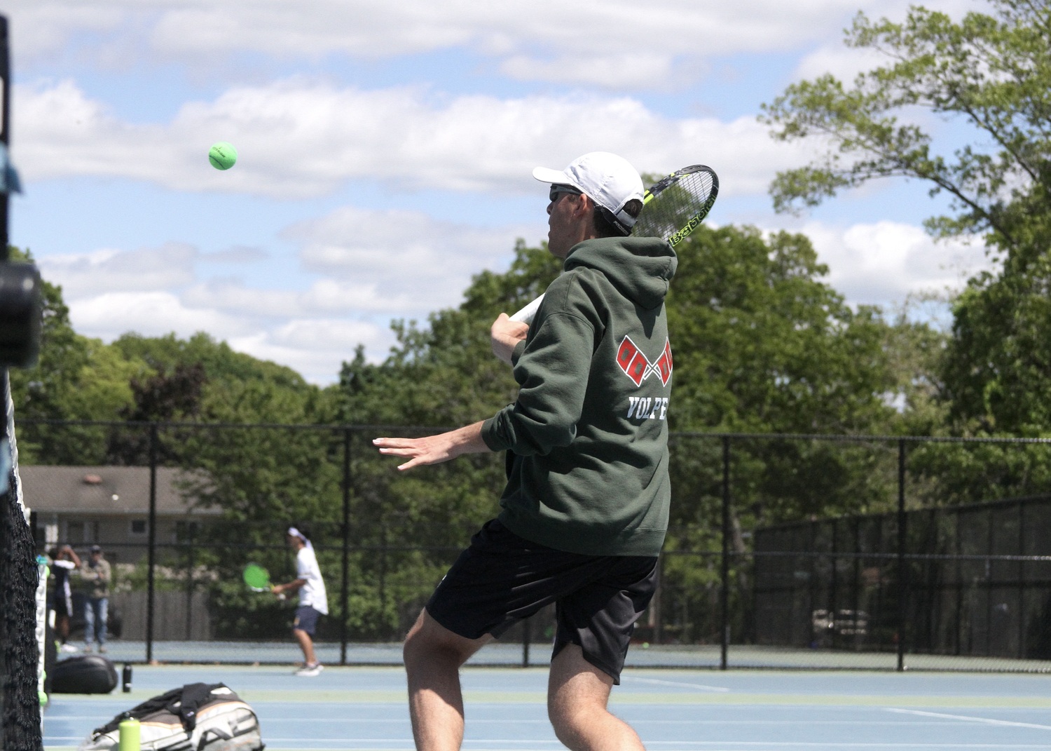 Senior Giancarlo Volpe volleys. DESIRÉE KEEGAN