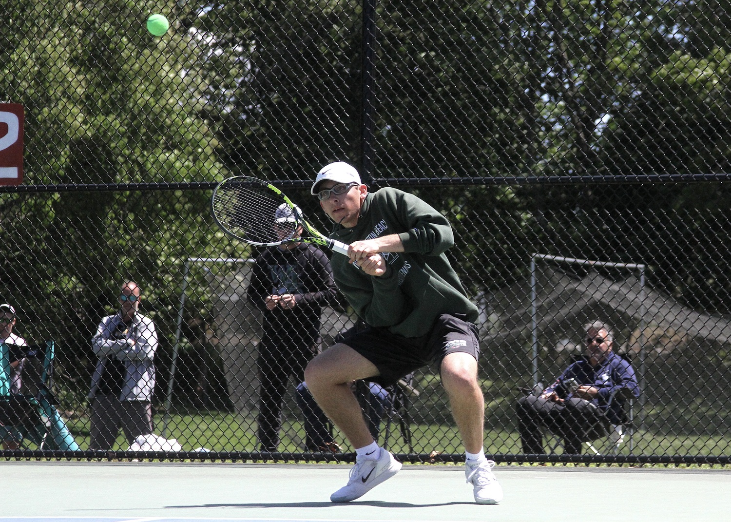 Senior Giancarlo Volpe powers the ball back over the net. DESIRÉE KEEGAN