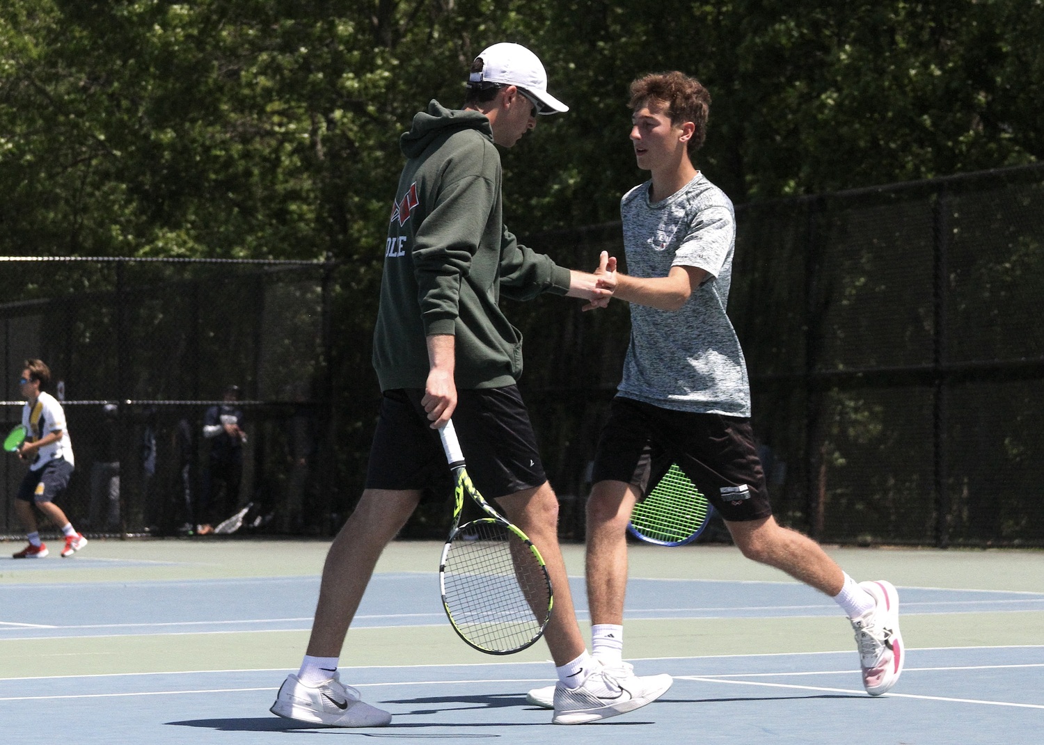 Senior Giancarlo Volpe and junior Bryce Groth lift each other up. DESIRÉE KEEGAN
