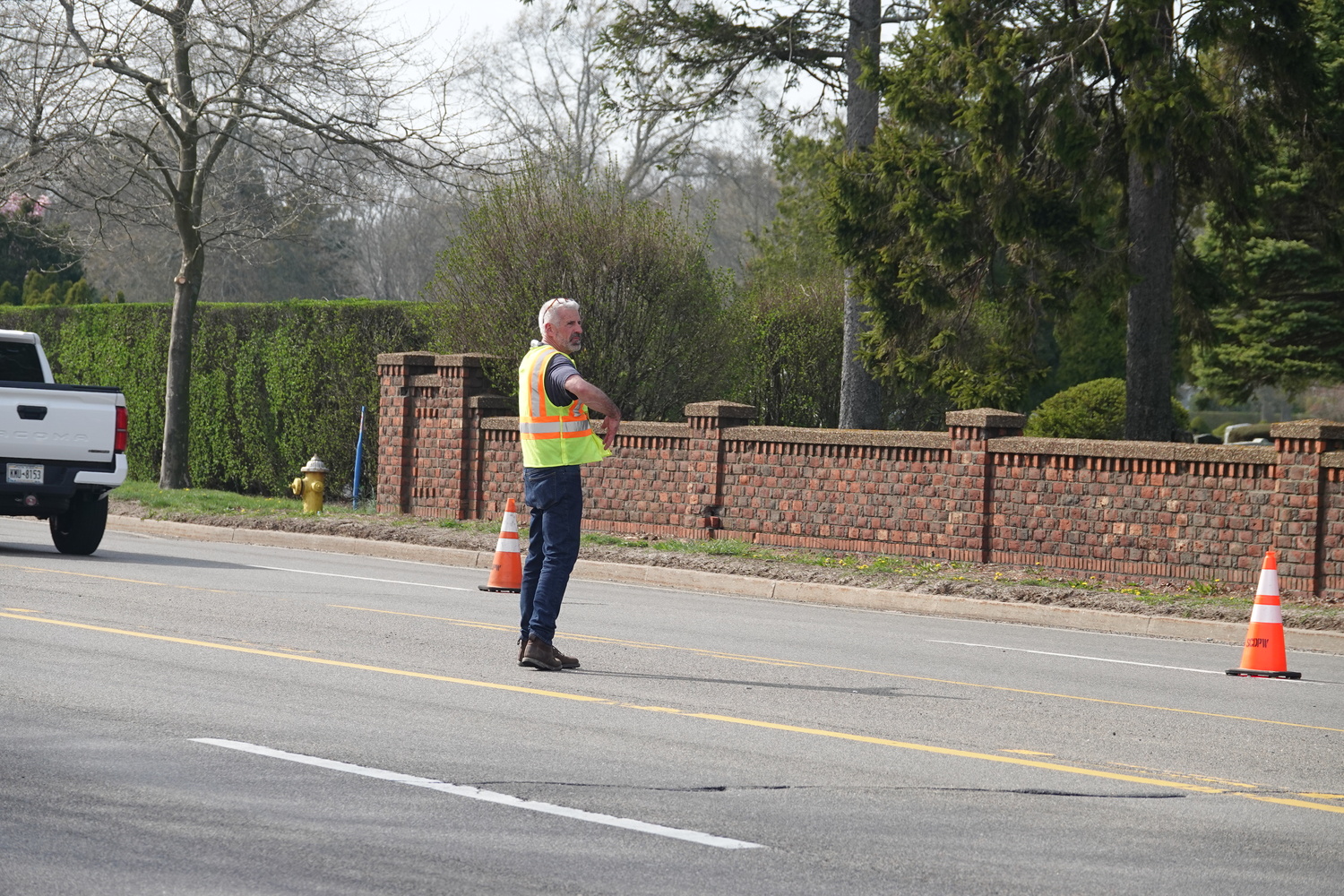 Southampton Town Highway Superintendent Charlie McArdle on County Road 39 during the blinking lights experiment. MICHAEL WRIGHT