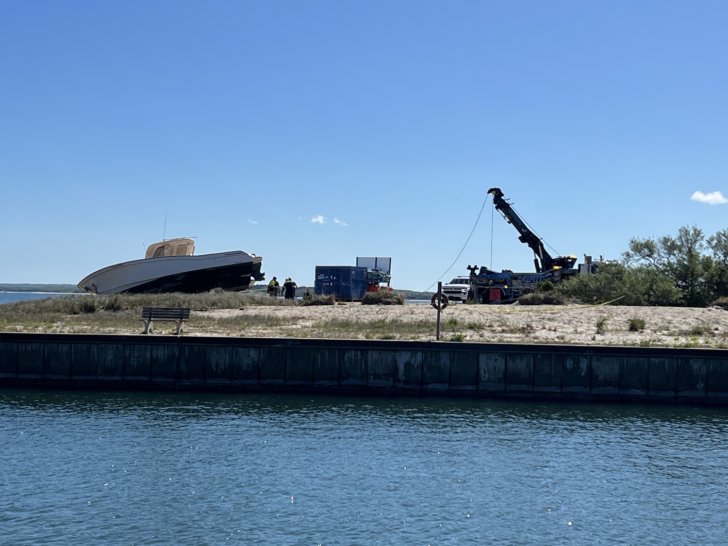 The 33-foot Grady White was being removed from the beach at Meschutt Beach County Park on Monday morning. DANA SHAW