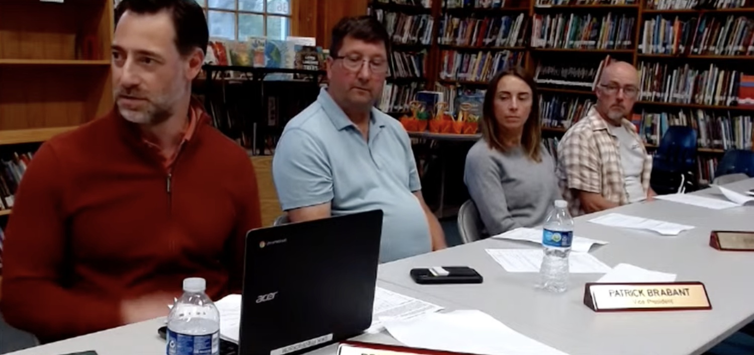 Springs School Board of Education President Erik Fredrickson, Vice President Patrick Brabant and Trustees Emma Field and Dermot Quinn during a budget hearing May 13.