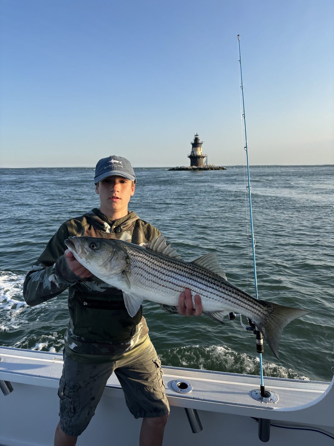 Will Essay pulled this nice striped bass from the waters of Plum Gut. BILL PELL