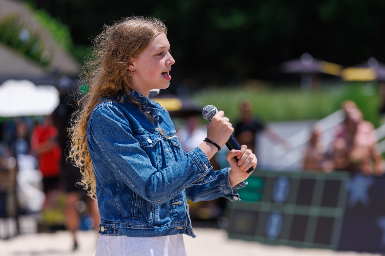 Bailey DeLauter opens the action with the singing of the national anthem on Sunday. AVP worked with CM Performing Arts Center in Oakdale to find a singer and came up with Bailey.  MPU DINANI