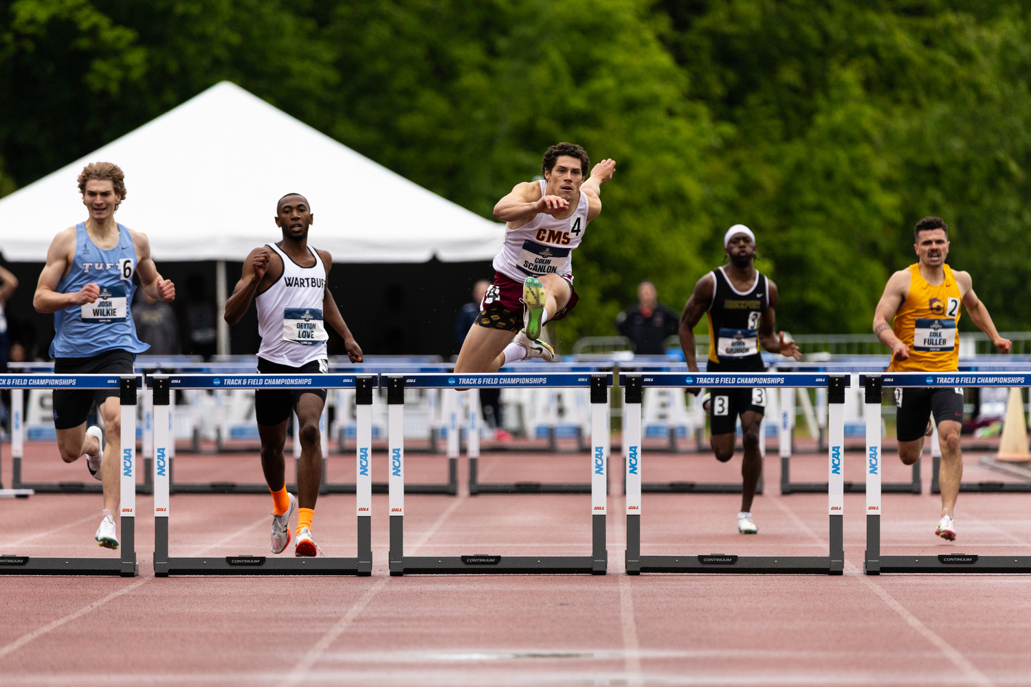 Colin Scanlon placed second in the 400-meter hurdles at the NCAA Division III Championships.  AARON BREWER