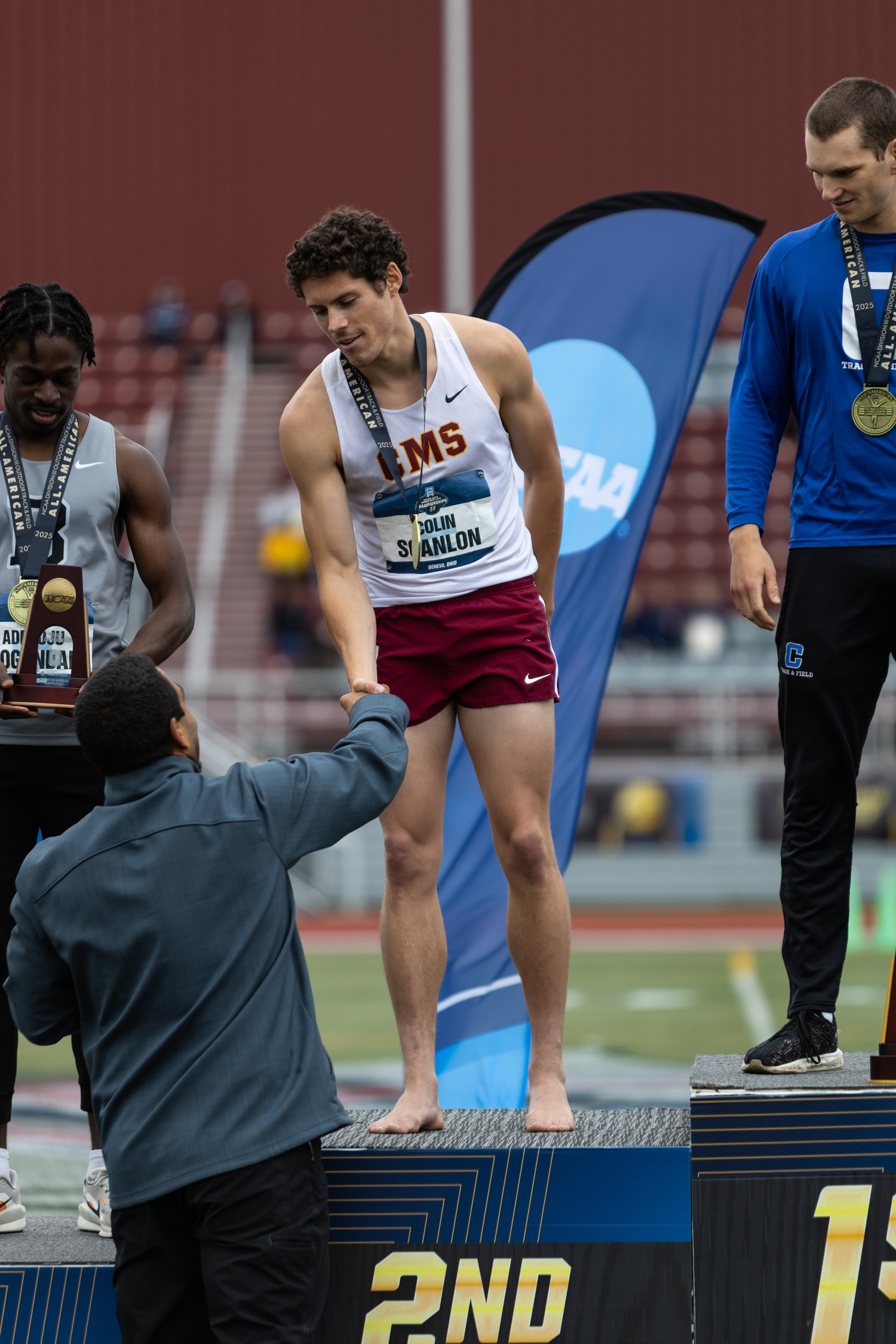 Colin Scanlon placed second in the 400-meter hurdles at the NCAA Division III Championships.  AARON BREWER