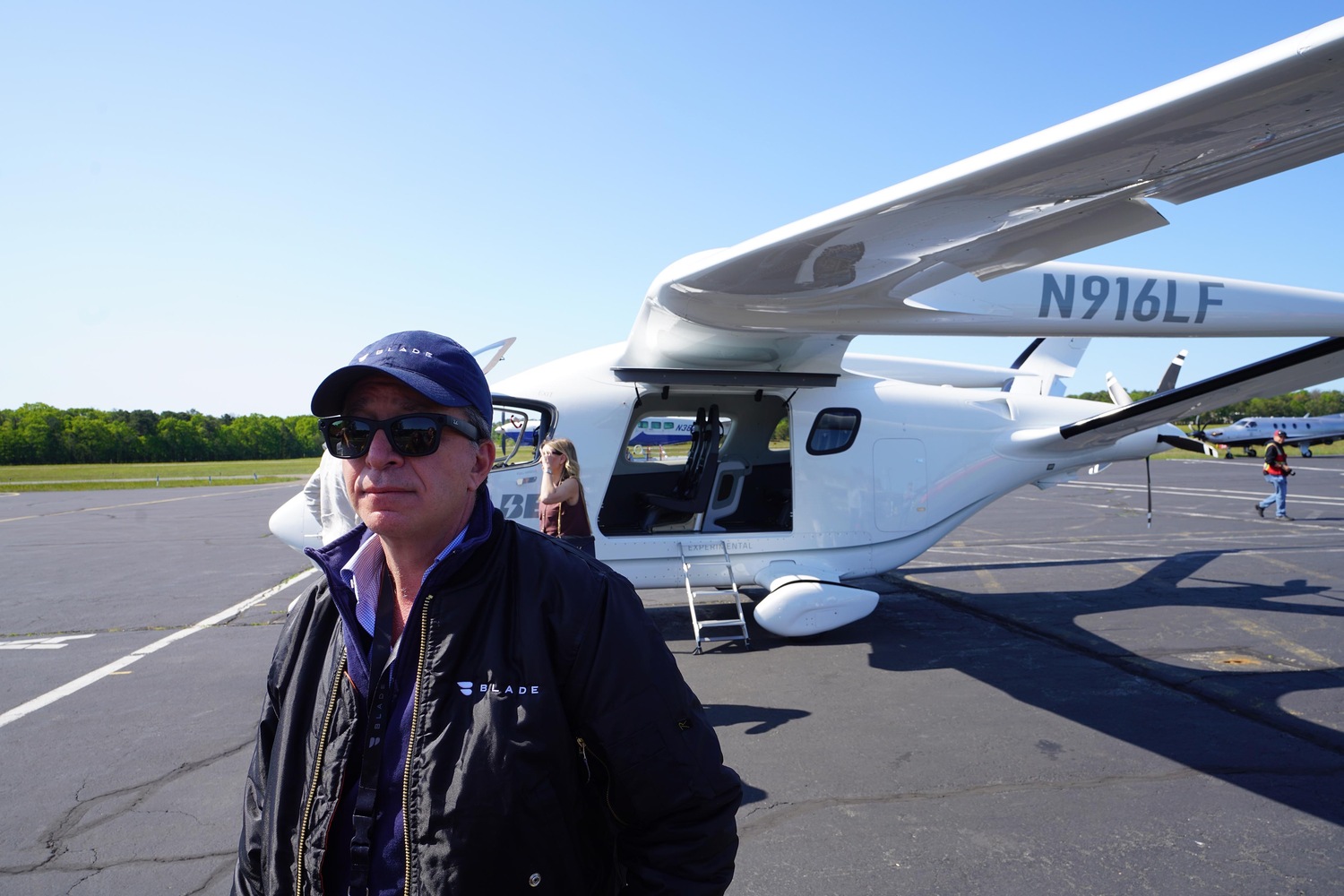Blade CEO Rob Wiesenthal waits to board the electric aircraft at East Hampton Airport. DOUG KUNTZ