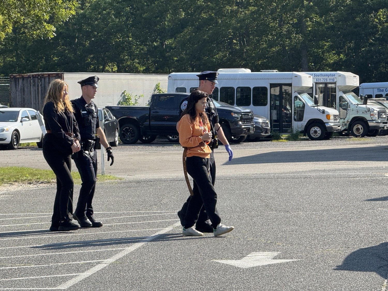 Amanda Kempton, charged in the death of Sara Burack, is seen here being led to court to be arraigned Saturday. T E McMorrow