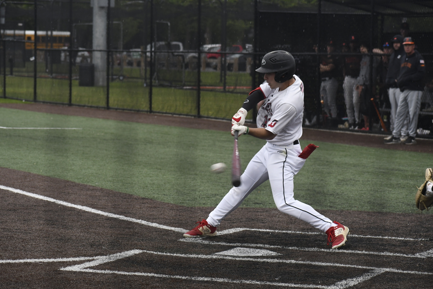 Pierson senior Max Krotman puts the ball in play.  DREW BUDD