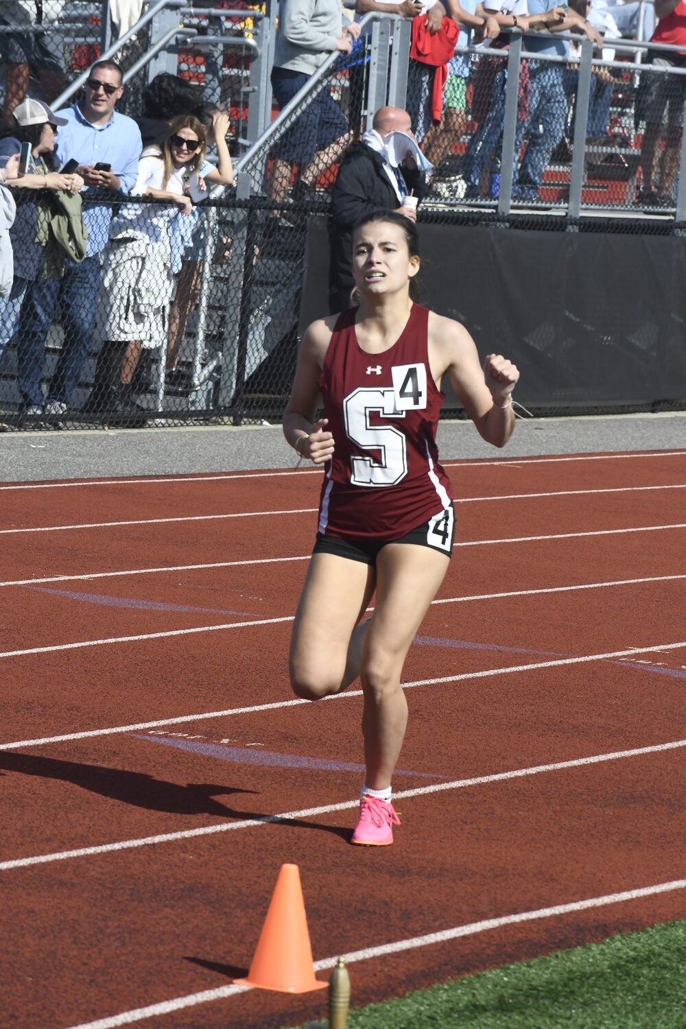 Emma Suhr heads toward the finish line in the 800-meter race.  DREW BUDD