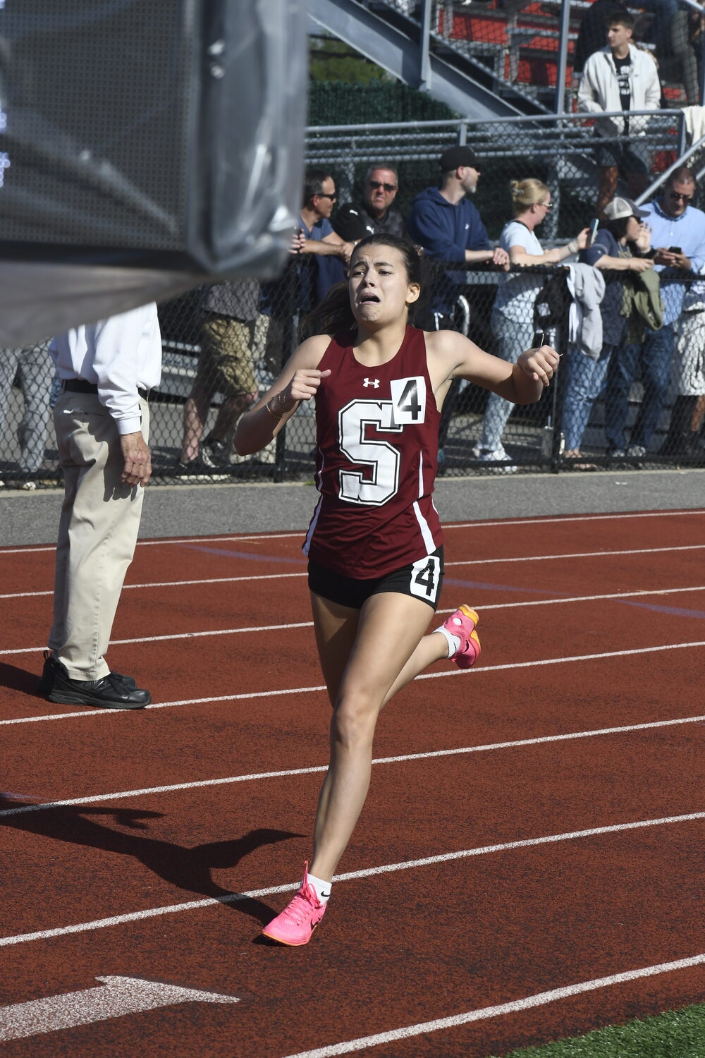 Emma Suhr heads toward the finish line in the 800-meter race.  DREW BUDD