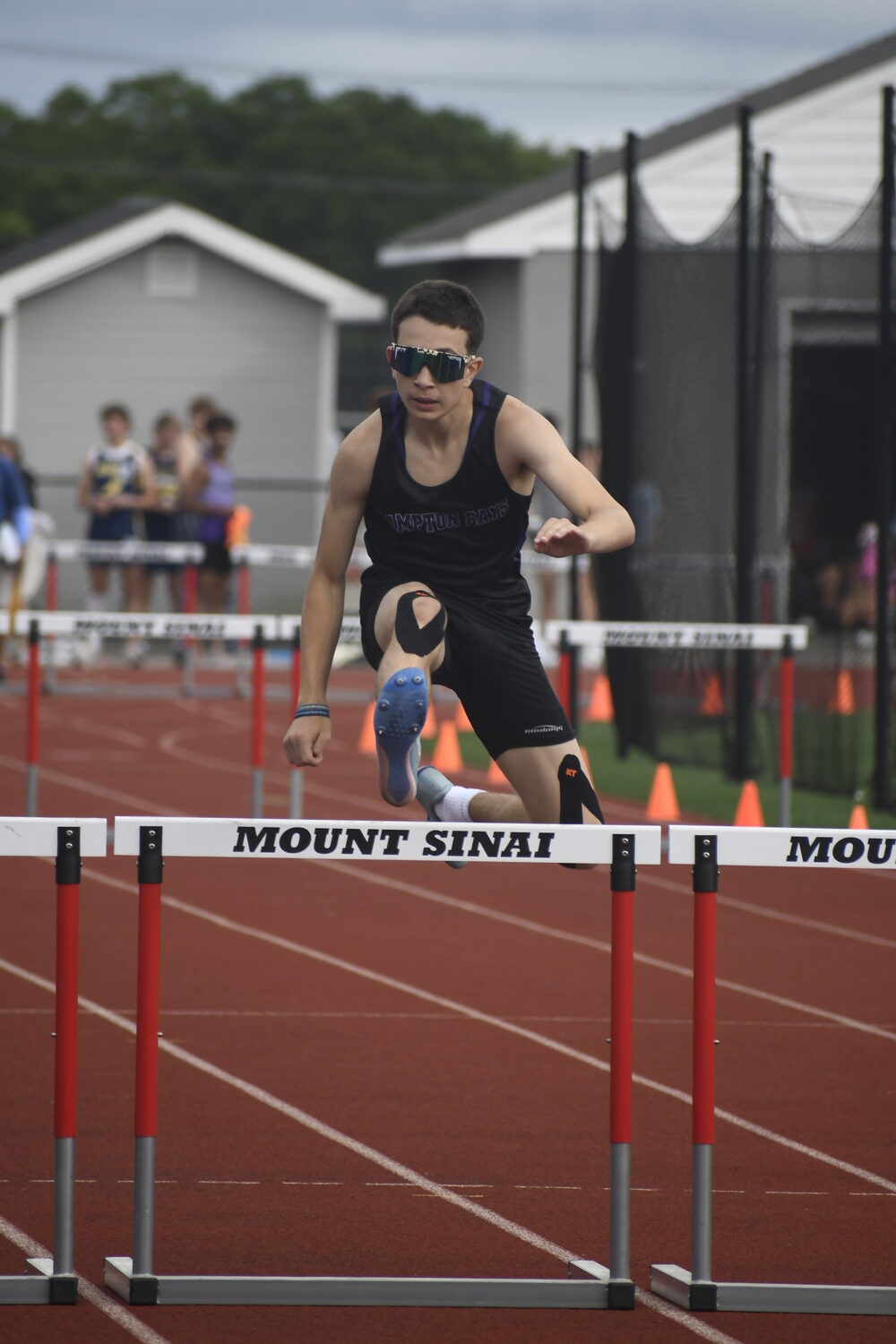 Hampton Bays freshman Daniel Pimenta finished third in the 400-meter hurdles to earn All-County honors.  DREW BUDD