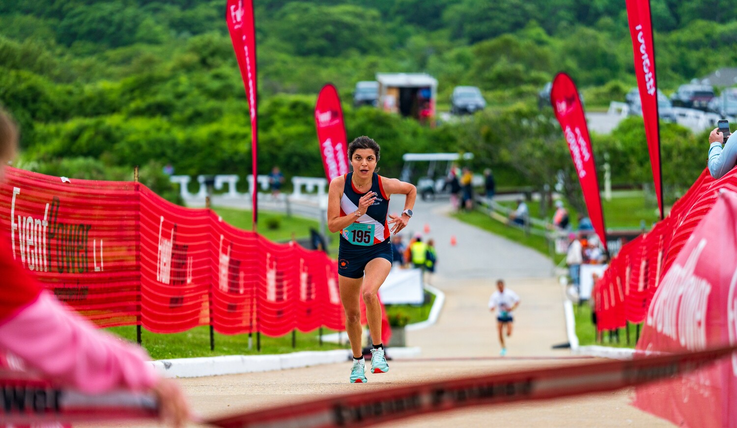 Women's champion Lara Jacobs heads up toward the finish line.   ENDURANCE SPORTS PHOTOGRAPHY