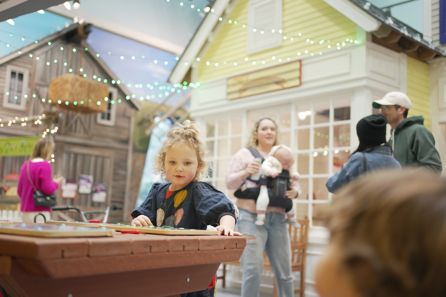 Puzzle tables are just one of many experiences children enjoy at CMEE. Courtesy of CMEE