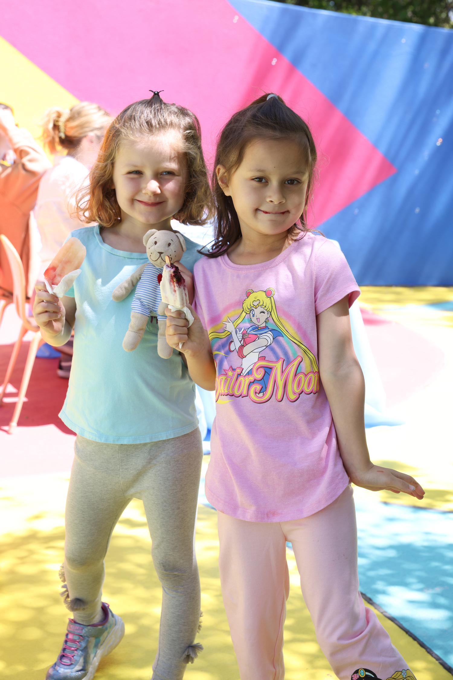 Young visitors enjoy some ice cream at the CMEE annual Block Party. Courtesy of CMEE