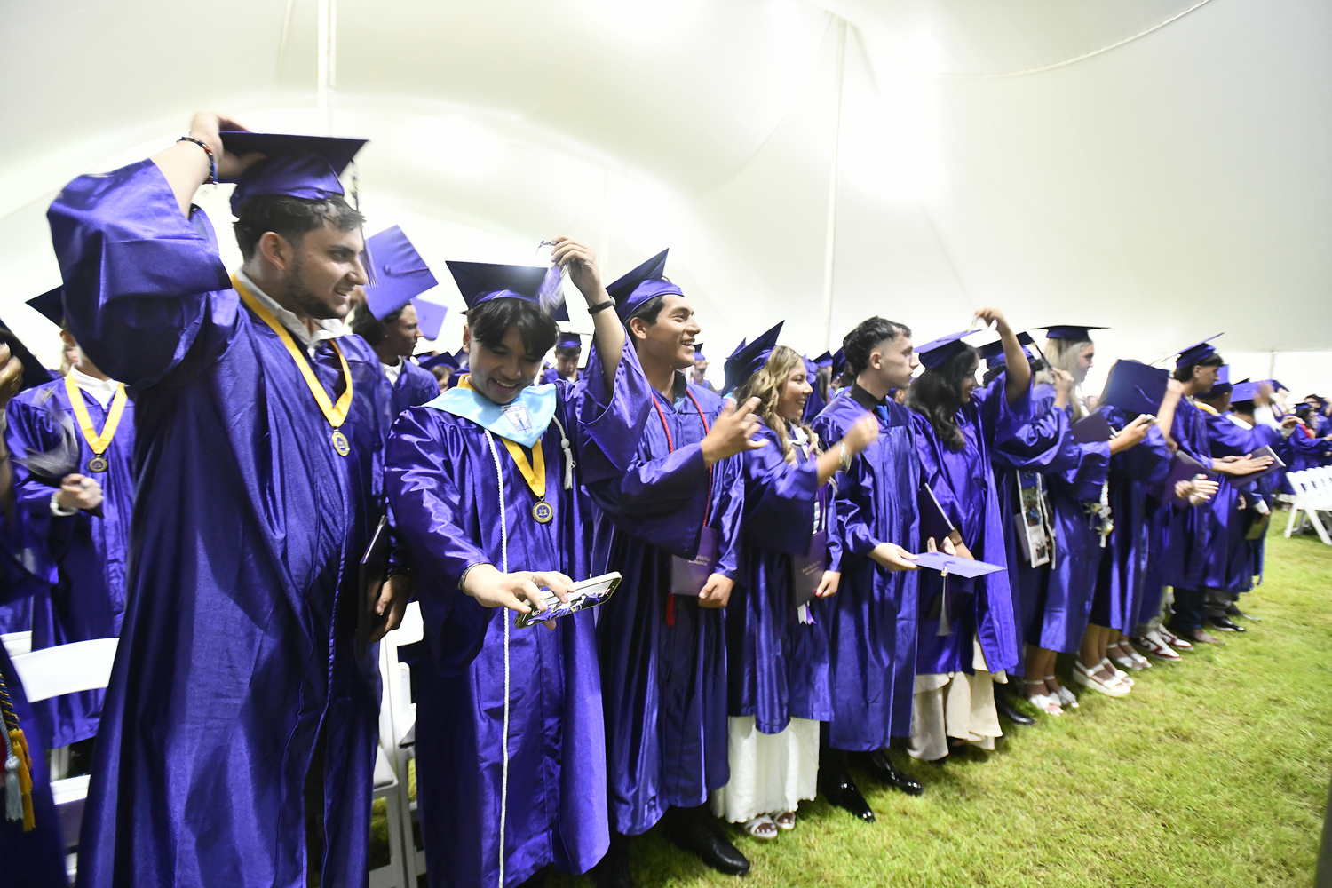 Members of the Class of 2025 move their tassels.  DANA SHAW