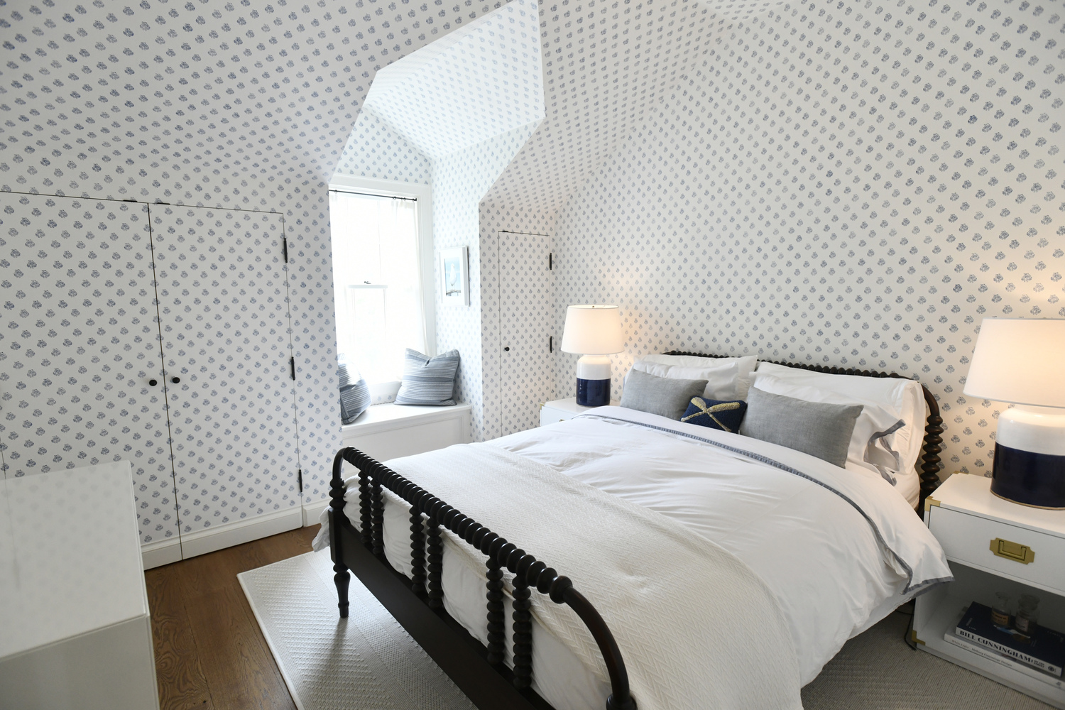 An extra bedroom with hand printed wall paper.  DANA SHAW
