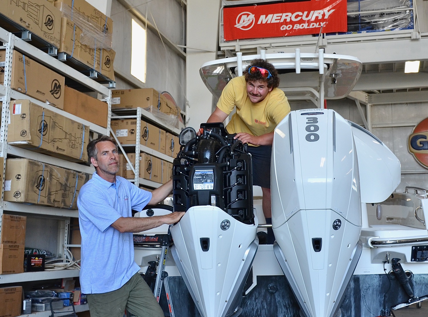Head mechanic Jeremy Somero (blue shirt) and fellow mechanic John Rutkowski. KYRIL BROMLEY PHOTOS