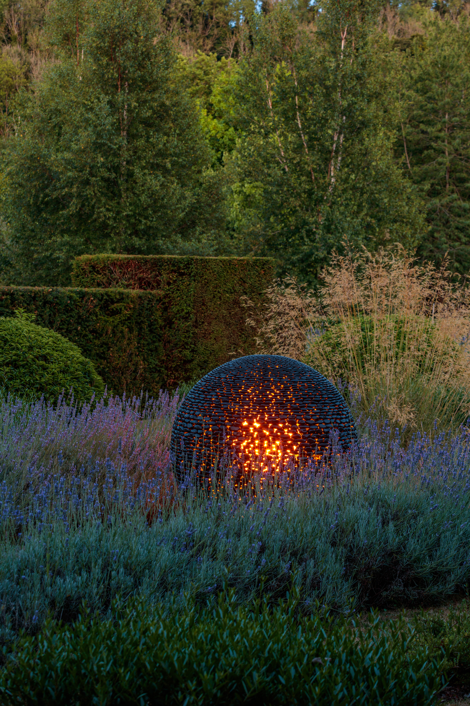 Crafted from polished black stones or slate shards, 