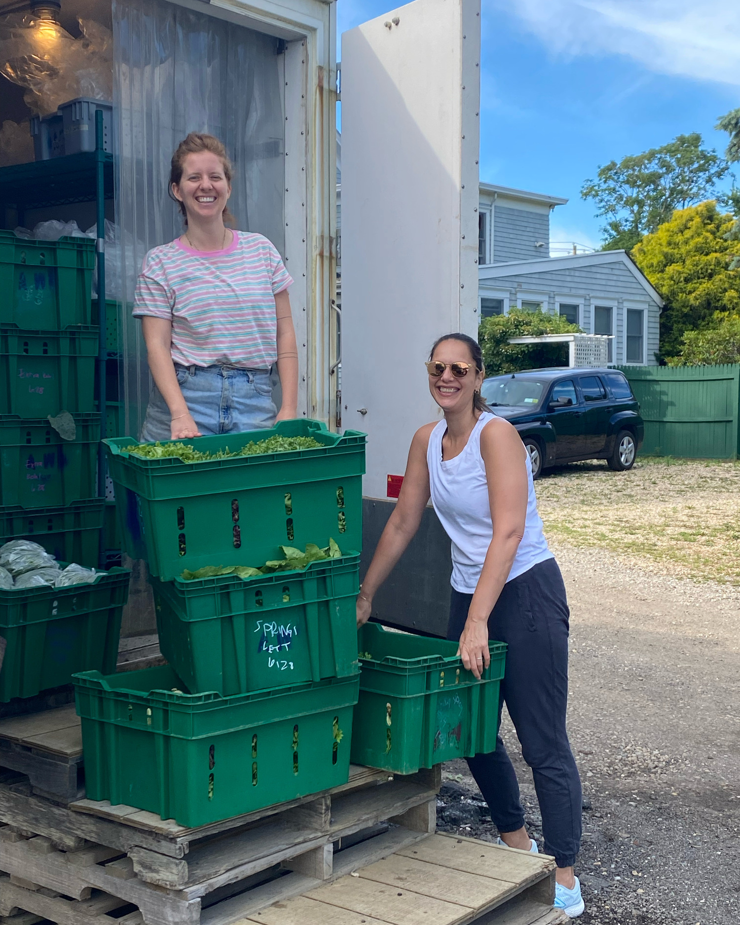 Volunteers with the South Fork chapter of Food Rescue US unload crates of vegetables at the Springs Food Pantry. Food Rescue US- South Fork photo