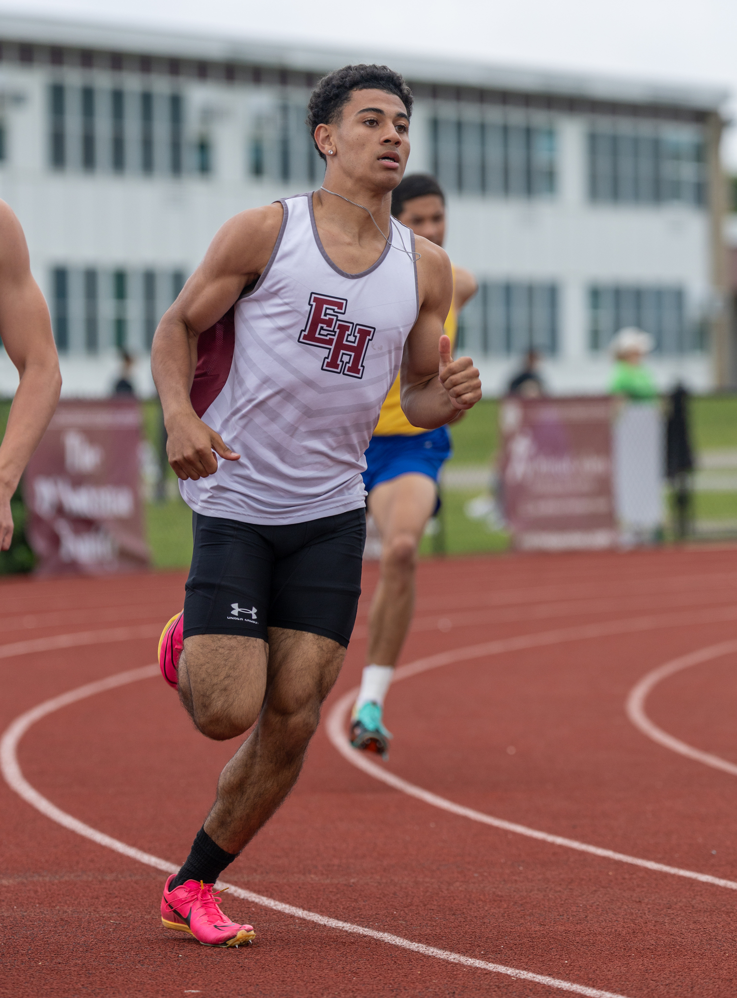 Xavier Johnson turns the corner in the 200-meter dash.   RON ESPOSITO