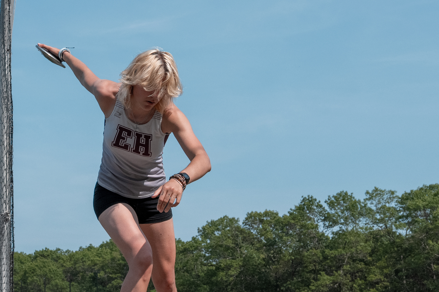 East Hampton junior Leah McCarron rears back in the discus.  RON ESPOSITO