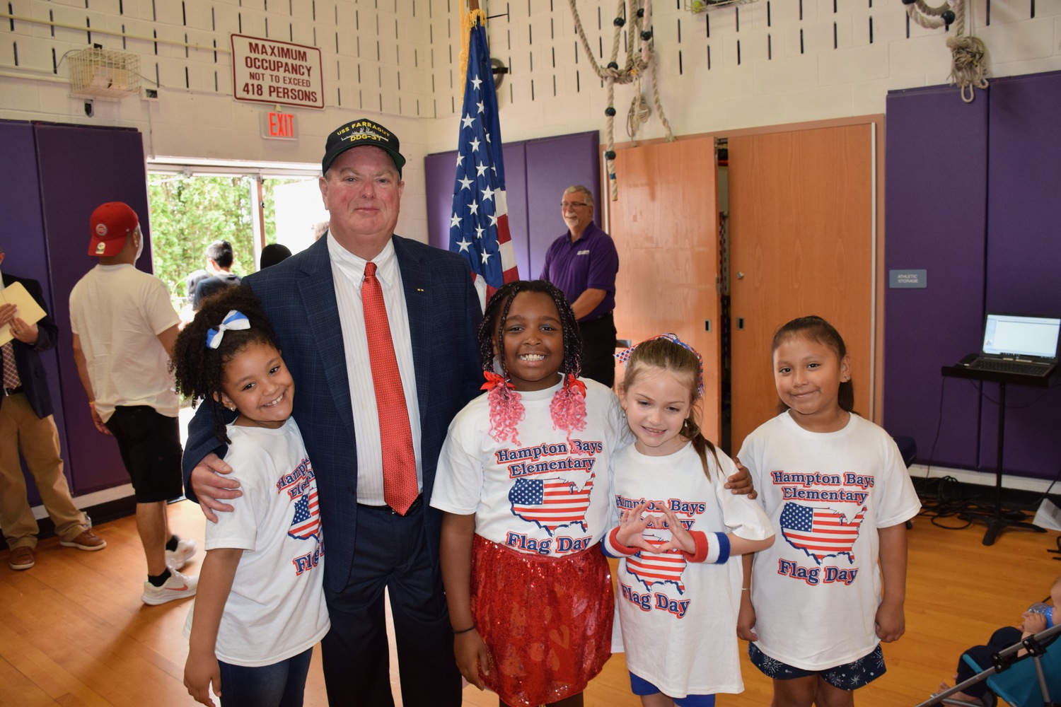At its annual Flag Day celebration, Hampton Bays School District also paid tribute to Southampton Town Justice Patrick Gunn, who is a veteran of the U.S. Navy. COURTESY HAMPTON BAYS SCHOOL DISTRICT
