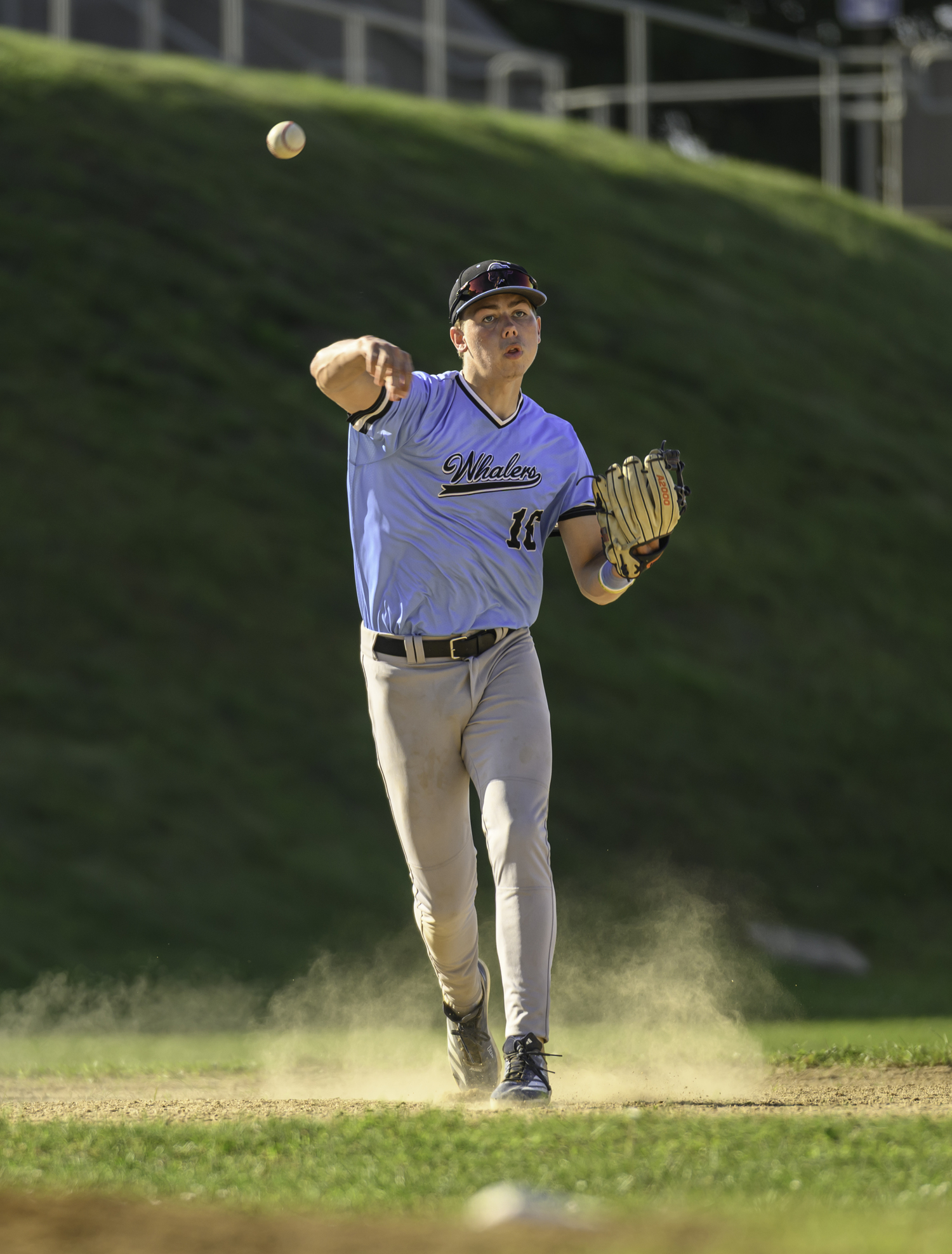 Third baseman Jaxon Beiswenger (Bucknell) throws to first.  MARIANNE BARNETT