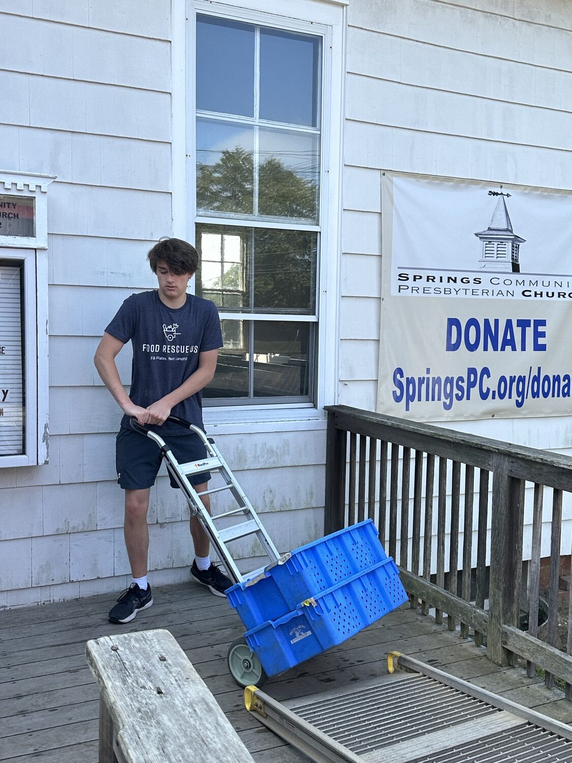 A volunteer with the South Fork chapter of Food Rescue US brings vegetables to the Springs Food Pantry. Food Rescue US- South Fork photo