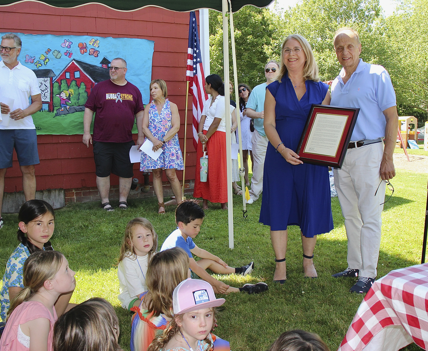 The Sagaponack School recognized Cathy Hatgistavrou’s retirement from the School Board on June 24. Ms. Hatgistavrou was presented with gifts and certificate of appreciation from Superintendent John Finello, right. She was also presented with a certificate from New York State Assemblyman Tommy John Schiavoni.    KYRIL BROMLEY