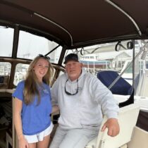 Captain Brad Ries and his daughter and first mate, Charleigh Ries, aboard his charter boat, Someday Came, in Hampton Bays. CAILIN RILEY
