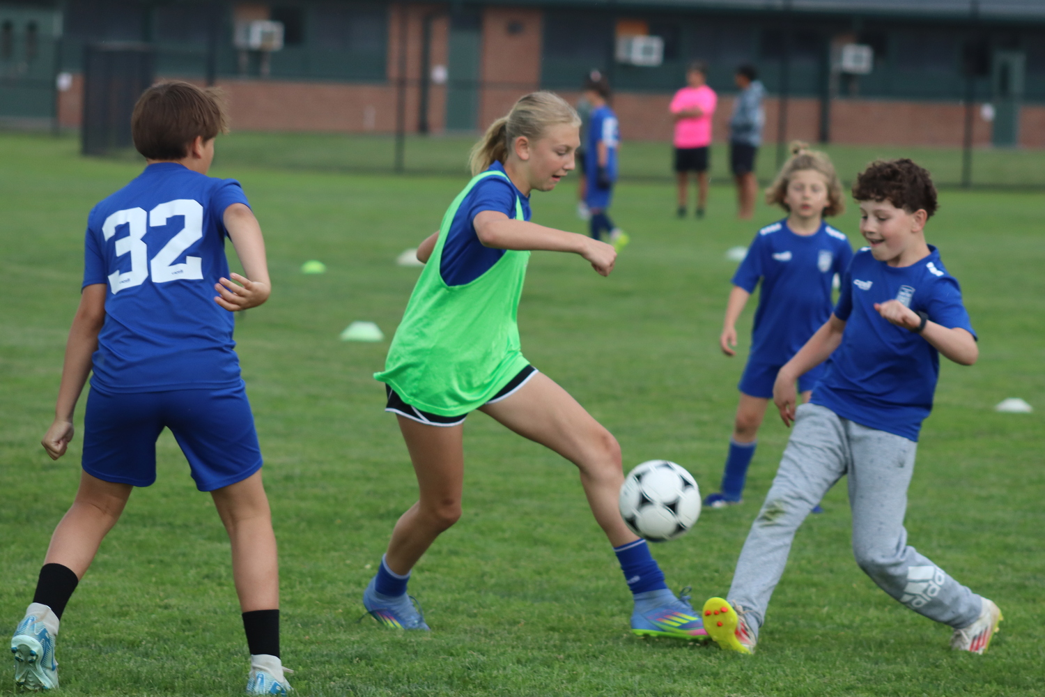 Southampton Town United players, parents and coaches gathered at Southampton High School on Friday night for the club's annual soccer festival. The club includes players from age 3 to 18, and had 26 travel teams compete in the Long Island Junior Soccer League this spring. The festival's main event, a game on the turf featuring the oldest club team, with players born in 2007, against coaches in the club, was named in honor of former coach Sean Collins this year. Collins died on May 2 after a battle with cancer. CAILIN RILEY