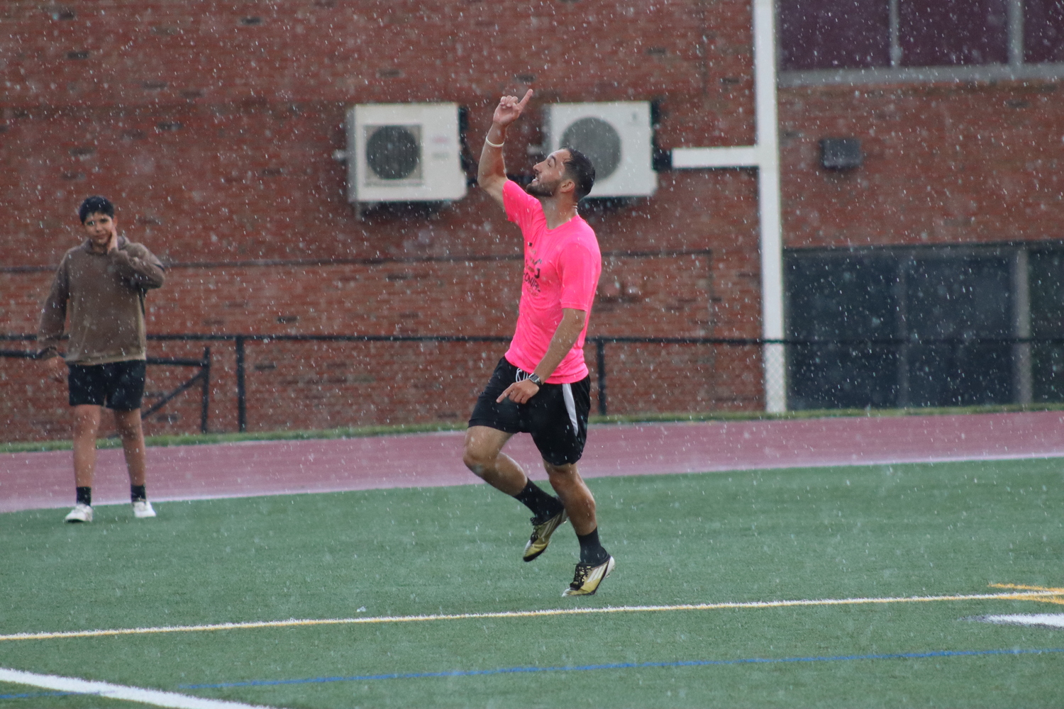 Coach Ignasi Cucurella celebrates after scoring a goal. CAILIN RILEY