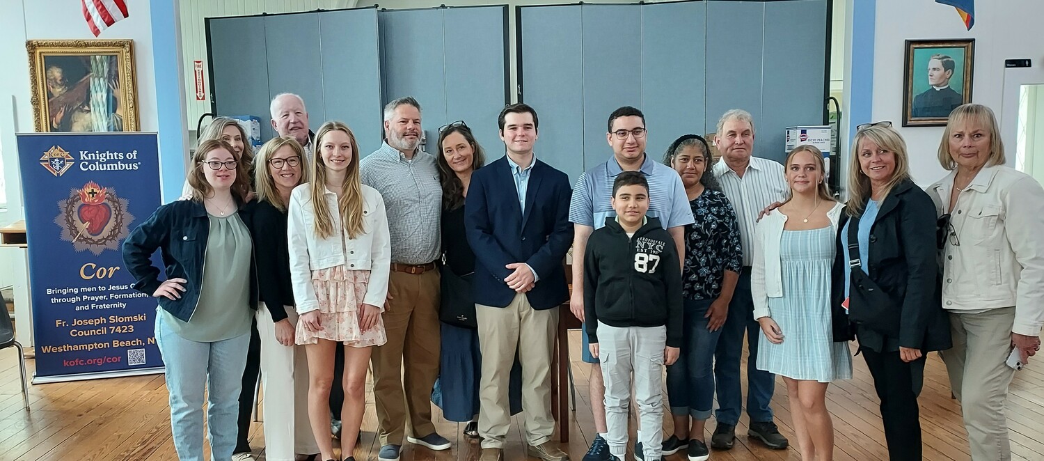 The Joseph Slomski Knights of Columbus Council (#7423), based at Immaculate Conception Church on Quiogue, recently announced the scholarship winners for 2025. With their parents, from left, are  Regan Moran, Cole Dawson, Ramiro Veliz and Jordan Razzano. COURTESY JOSEPH SLOMSKI KOC