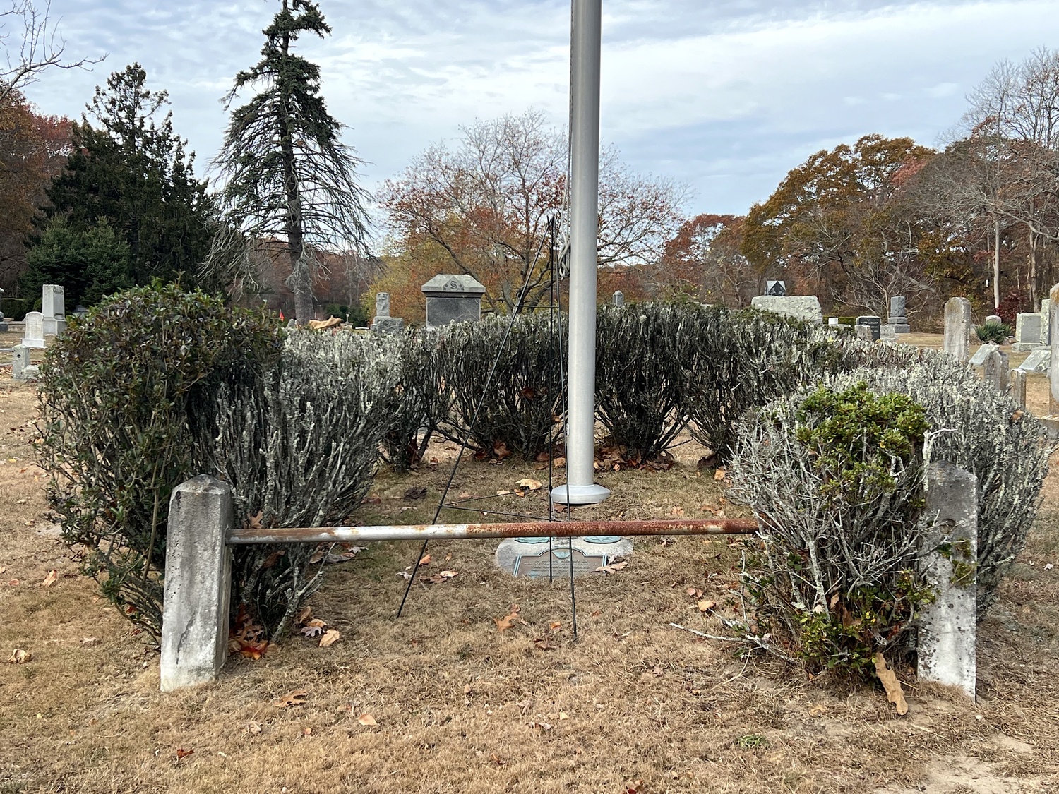 The entrance of Good Ground Cemetery in Hampton Bays was in disrepair. HEATHER HAYNIA