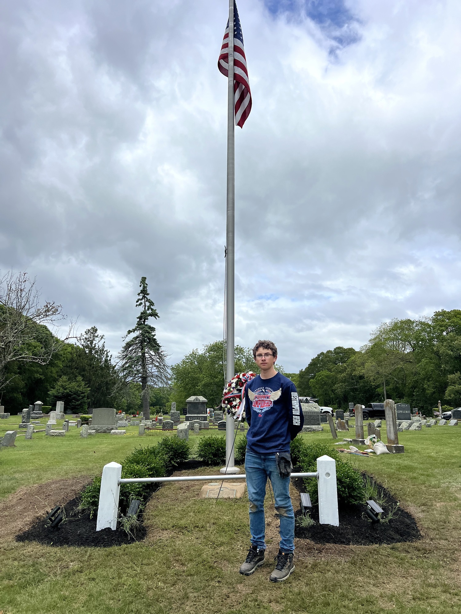 Westhampton Beach sophomore Magnus Haynia, a member of Hampton Bays Boy Scout Troop 483, reached the level of Eagle Scout after completing a revitalization project at Good Ground Cemetery. HEATHER HAYNIA