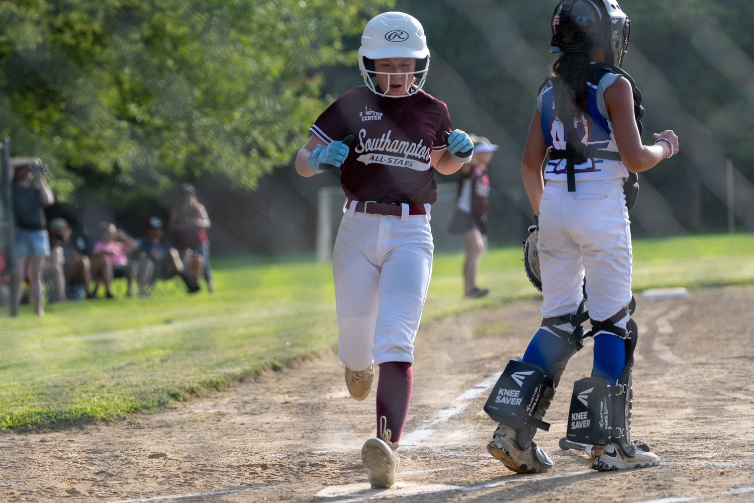 The Southampton 12-and-under Softball All-Stars played Riverhead/Eastport-South Manor at Downs Recreational Field on Monday.  RON ESPOSITO